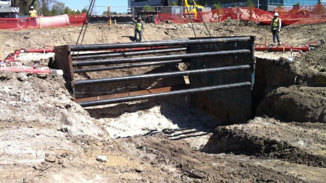 Landscape contractors working on drainage